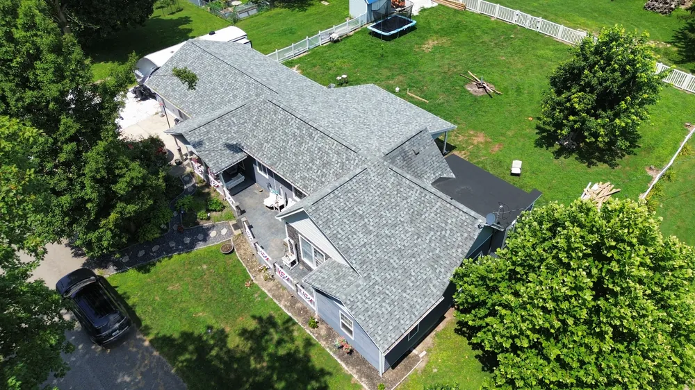 New roof tucked in the trees